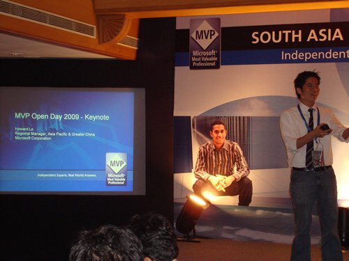 Man gesturing while speaking at a South Asia MVP Open Day event.